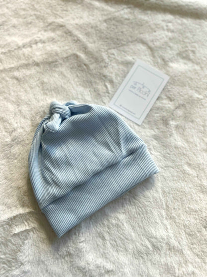 Cappellino neonato con nodo in jersey di cotone a costine