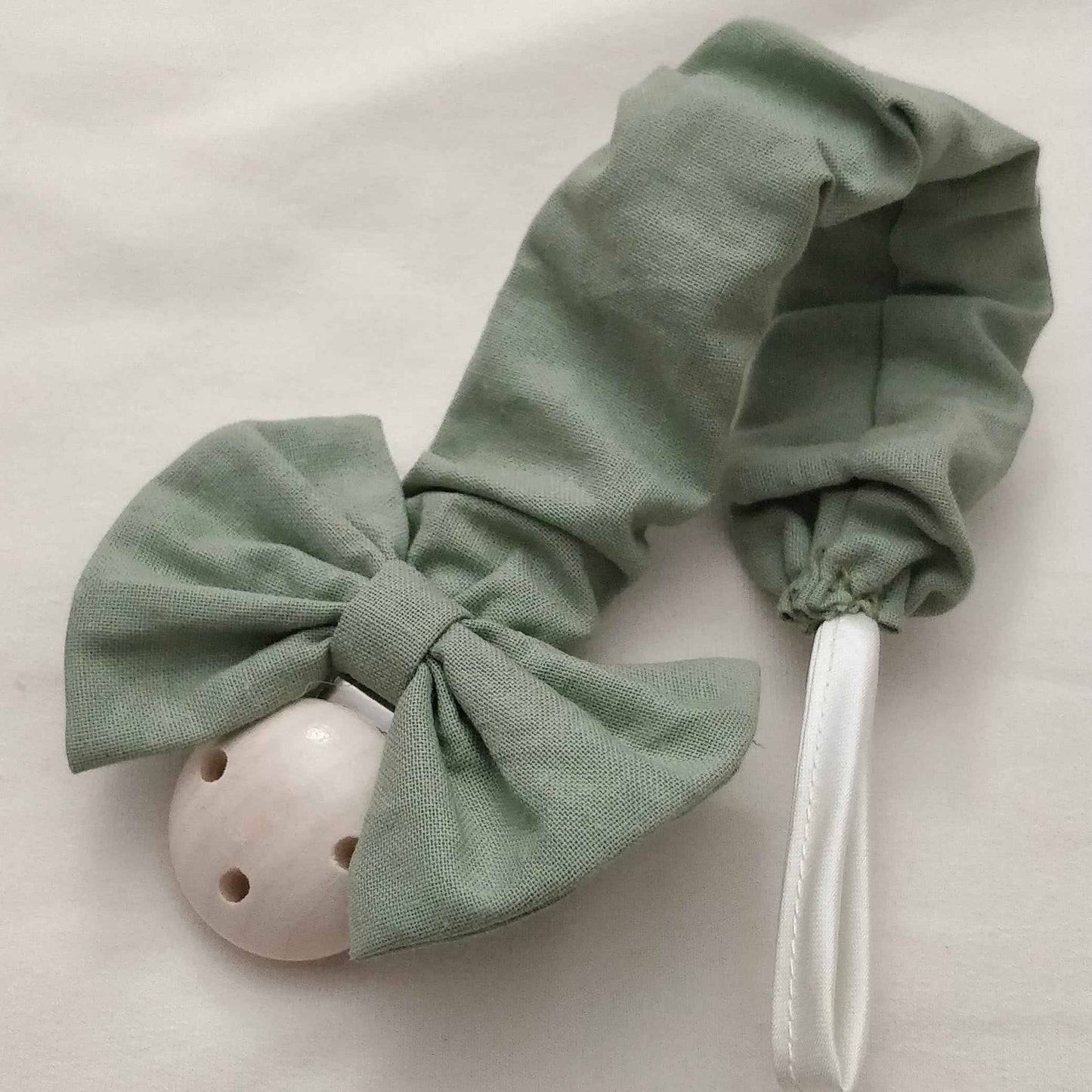 Catenella portaciuccio con fiocco