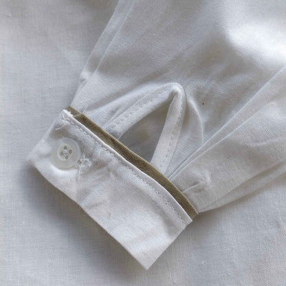 Camicia cerimonia bambino in puro cotone con abbottonatura sul retro