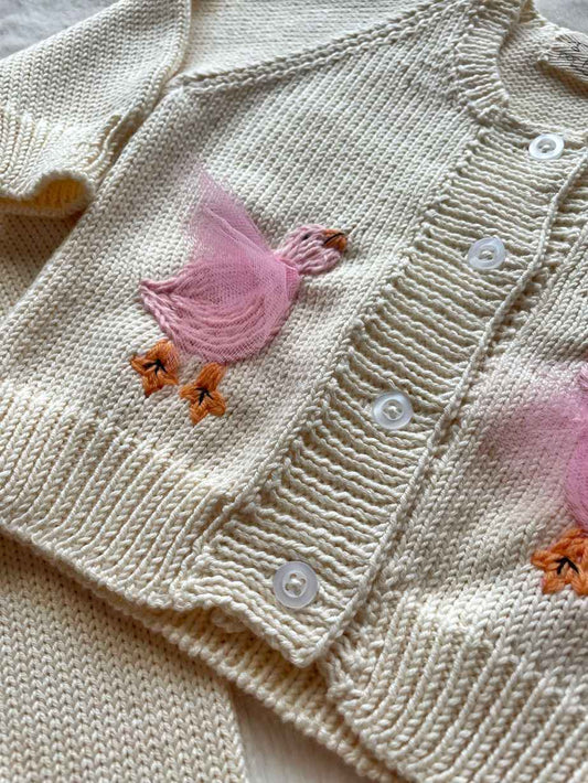Cardigan con ochette in lana baby per bambino